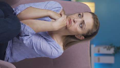 Vertical-video-of-The-grieving-woman-is-thinking-and-suffering-from-depression.